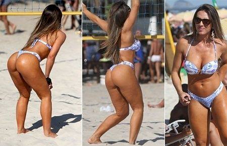 Nicole Bahls mostra curvas e se diverte jogando vôlei na praia